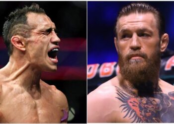 Tony Ferguson Conor McGregor (© Stephen R. Sylvanie-USA TODAY Sports)