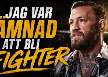 Conor McGregor under en intervju i skjorta och halsband