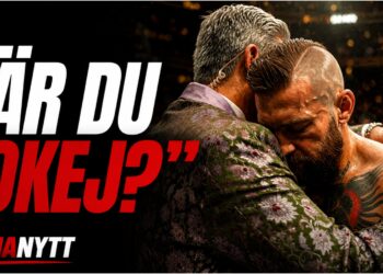 Bruce Buffer och Conor McGregor i en kram efter UFC-matchen
