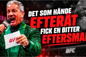 Bruce Buffer med mikrofon i UFC-buren