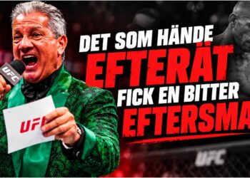 Bruce Buffer med mikrofon i UFC-buren