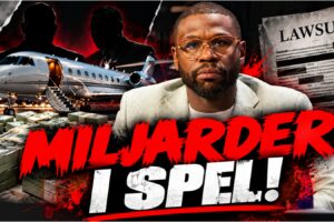 Floyd Mayweather i ljus kavaj med mikrofon under intervju